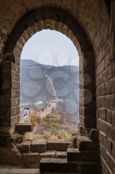 Great Wall of China at Mutianyu viewed through doorway of watchtower