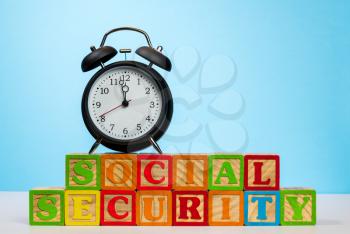 Time running out concept for Social Security trust fund with alarm clock approaching midnight