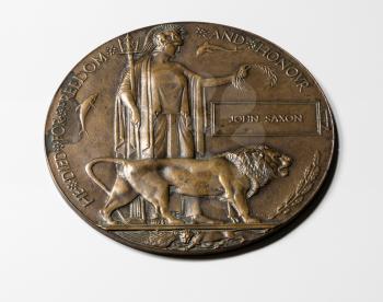 Historic memorial plaque or remembrance medal created in 1917 for British Soldiers who died in the Great War