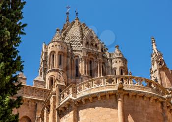 Ornate carvings and bell tower of the Old Cathedral in Salamanca