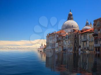 Concept image of a flooded Santa Maria Salute church in Venice as sea level rise makes the city uninhabitable
