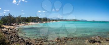 Panorama of the wide sandy Kailua Beach with mountains in background on east coast of Oahu in Hawaii
