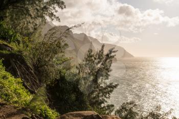 Mountains recede into the distance from overlook on Kalalau trail on Na Pali coast of Kauai
