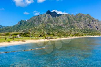 Aerial view of the beach and park at Kualoa with Ko'olau mountains in the background