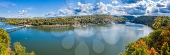 Aerial drone panorama of the autumn fall colors surrounding Cheat Lake near Morgantown, West Virginia