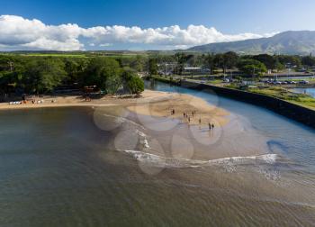 Aerial shot of the river anahulu leading to the twin arched road bridge in the North Shore town of Haleiwa