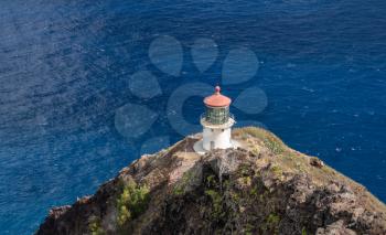 Old lighthouse on the cliff side on Makapu'u point on Oahu in Hawaii