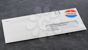 Envelope containing voting ballot papers being sent by mail for absentee vote in presidential election