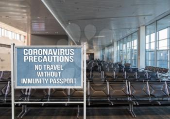 Concept of notice board about using immunity certificate or passport to travel through airport due to coronavirus
