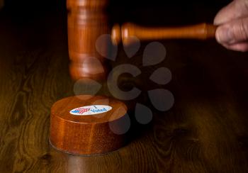 I voted campaign sticker on the gavel being hit by mallet as the concept of judges overruling the rights of voters in the election