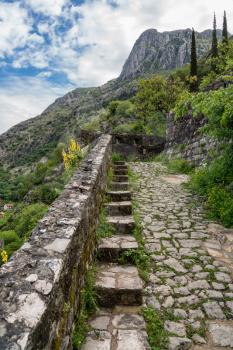 Steep pathway to fortress and church above old town Kotor in Montenegro
