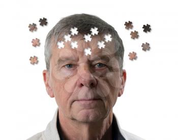Front view and face of senior caucasian man worried of mental illness, dementia or Alzheimer's disease using jigsaw concept