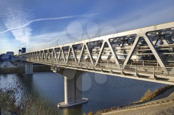 The bridge through the river for the high-speed train. Transport infrastructure.