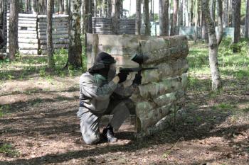 Russia, Volgodonsk - June 30, 2015: Paintball. Shooting competition of weapons with paint balls. Forest tournament