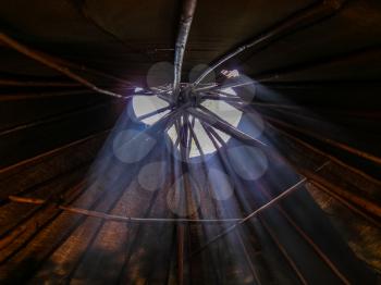 Light makes its way through the hole in the yurt. Igloo, the traditional home of the northern tribes