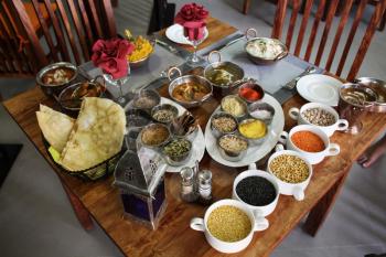 Table with bean grains, Products for the preparation of cereals from legumes. The food cooked at restaurant. Various dishes for every taste and choice.