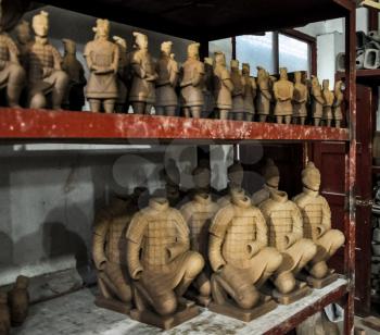 XIAN, CHINA - October 29, 2017: Clay busts in the museum. Souvenir workshop of the terracotta army. Souvenirs in the museum of the terracotta army.