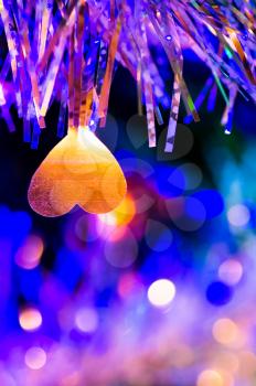 Christmas decorations near, tinsel and Christmas rain on the Christmas tree