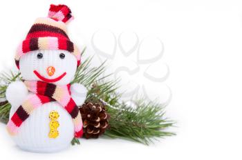 Christmas background with snowman and pine branch