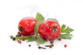 red tomatoes,basil and pepper on white background