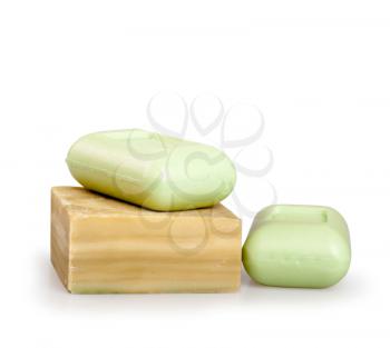 Bars of natural handmade soap on a white background