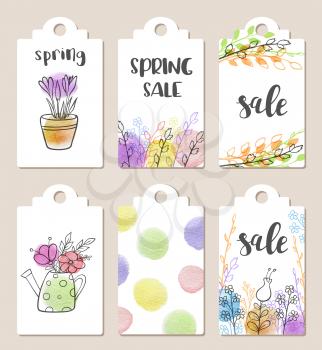 Set of hand drawn tags for spring sale with watercolor textures and flowers