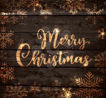 Vintage vector Christmas background with snowfllakes on a wooden board. Merry Christmas lettering.