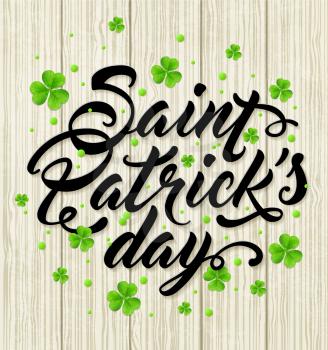 Lettering and green clover leaves on a wooden background. Greeting card for St. Patrick's Day. Vector illustration