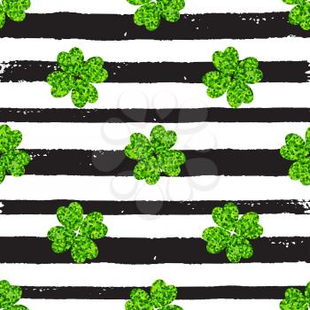 Decorative seamless pattern with black lines and green clover leaves on a white background. Design for St. Patrick's Day. 