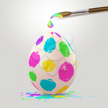 Hand painted multicolored Easter egg and paintbrush. Realistic vector illustration.