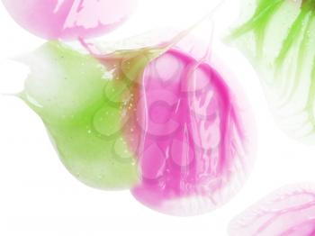 pink and green lipgloss isolated on white background