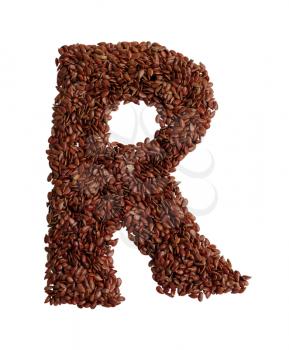 Letter R made with Linseed also known as flaxseed isolated on white background. Clipping Path included