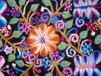 Peruvian hand made flower woolen fabric background