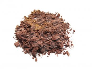 Close up of crushed eyeshadow cosmetic powder on white background