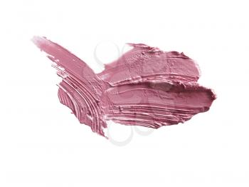 close up of a smudged lipstick on white background
