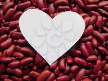 White Heart shape on Raw Red Kidney Beans Background