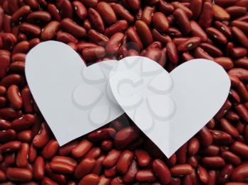 White Heart shape on Raw Red Kidney Beans Background