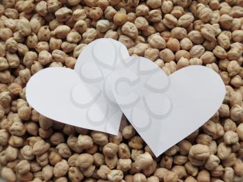 White Heart shape on pattern of chickpeas. healthy food