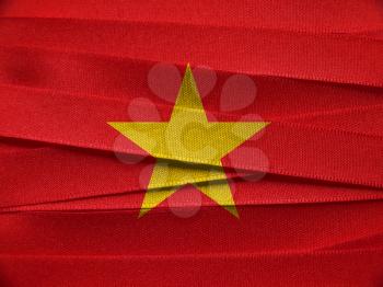 Vietnam flag or banner made with red ribbons