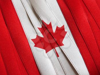 Canada flag or banner made with red and white ribbons