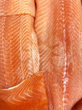 Salmon raw meat in a butcher shop, top view