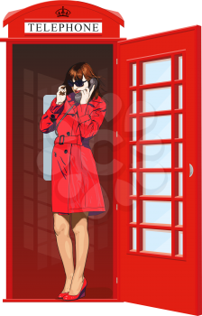 Beautiful young girl in bright clothes speak the English classic red phone booth
