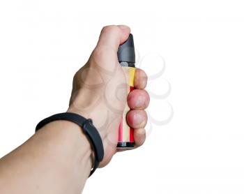man's hand holds a can of tear gas ahead of him isolated on white background