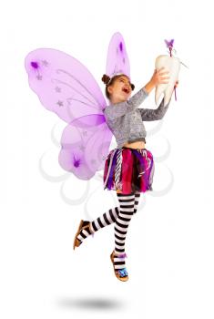 A very joyful Tooth Fairy with bouncing and flying wings holds an extracted tooth