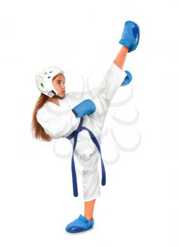 karate girl in a white kimono and a helmet and a blue outfit consisting of a belt of gloves and a foot practices striking