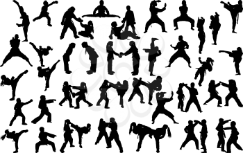 A large set of silhouettes of children of girls and boys practicing karate in different stances during the strike and blocks