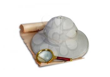 Tropical traveler's cork helmet lying on an old scroll or map next to a magnifying glass isolated on white background