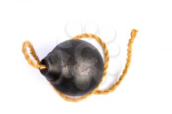 classic round black antique bomb with a long non-burning rope wick isolated on a white background
