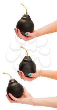 hands of an adult woman holding a classic round bomb with a wick in several positions on a white background