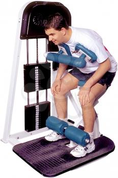 Royalty Free Photo of a Man on a Weight Lifting Machine